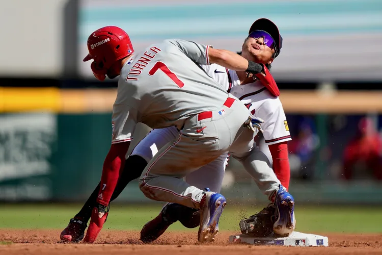 Braves rally past Phillies in playoff opener